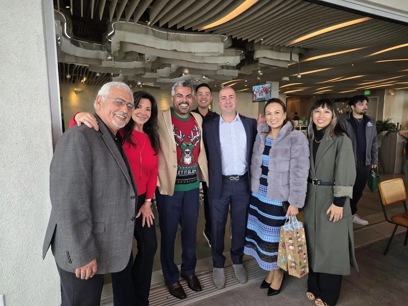 District 18 agency owners at a holiday community gathering